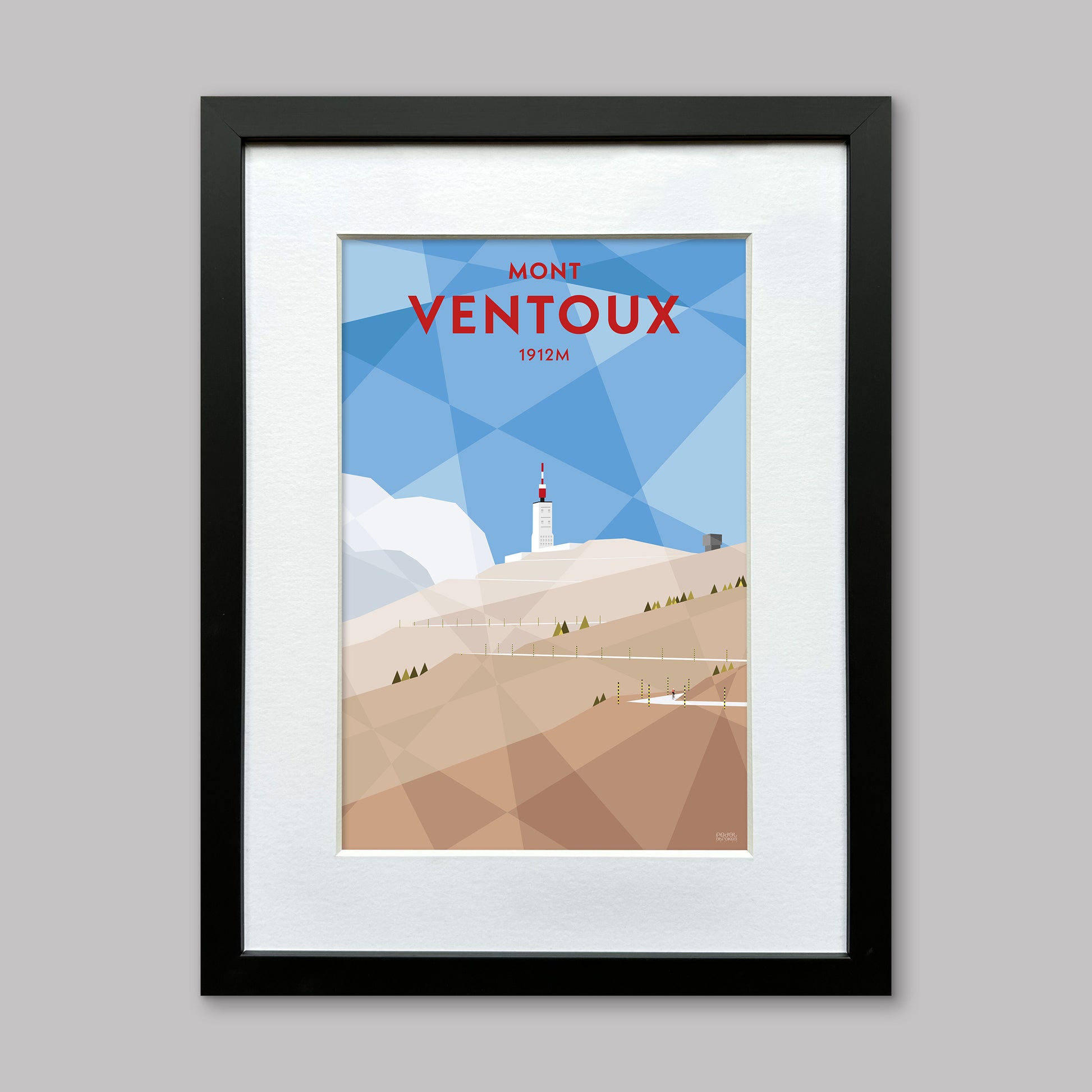 Print of a cyclist on the final few corners of the climb to the top of Mont Ventoux in Provence, presented in a black frame with a white mount.