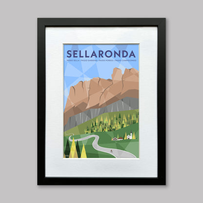 Framed and mounted poster of Sellaronda with dolomite mountains and a road and a cyclist